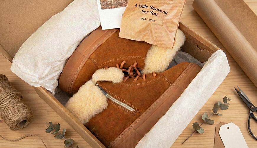 Sheepskin boots presented in a gift box, a perfect example of thoughtful and practical footwear gifting
