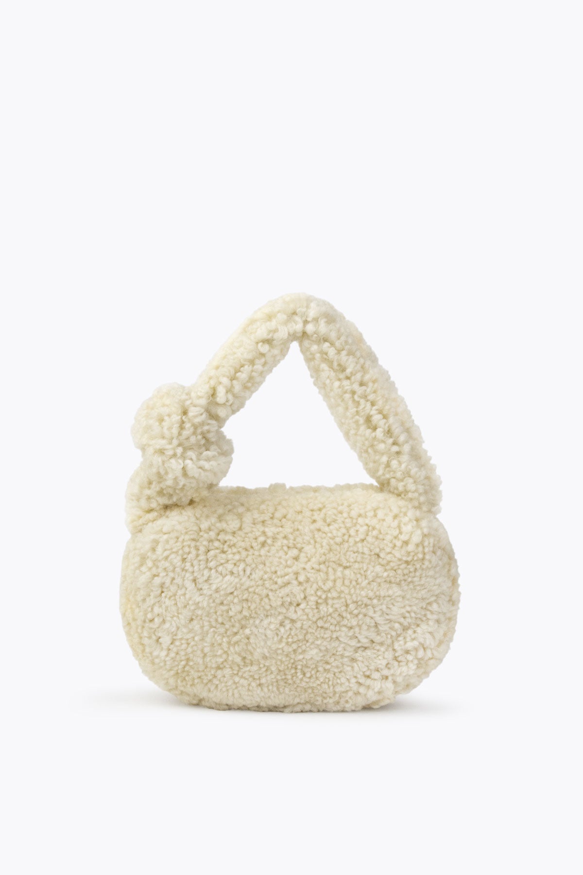 Mini sac à main en peau de mouton de Pegia Lova